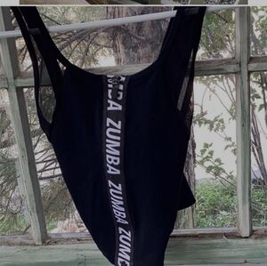 Zipper front black & white crop top, crosses in back.